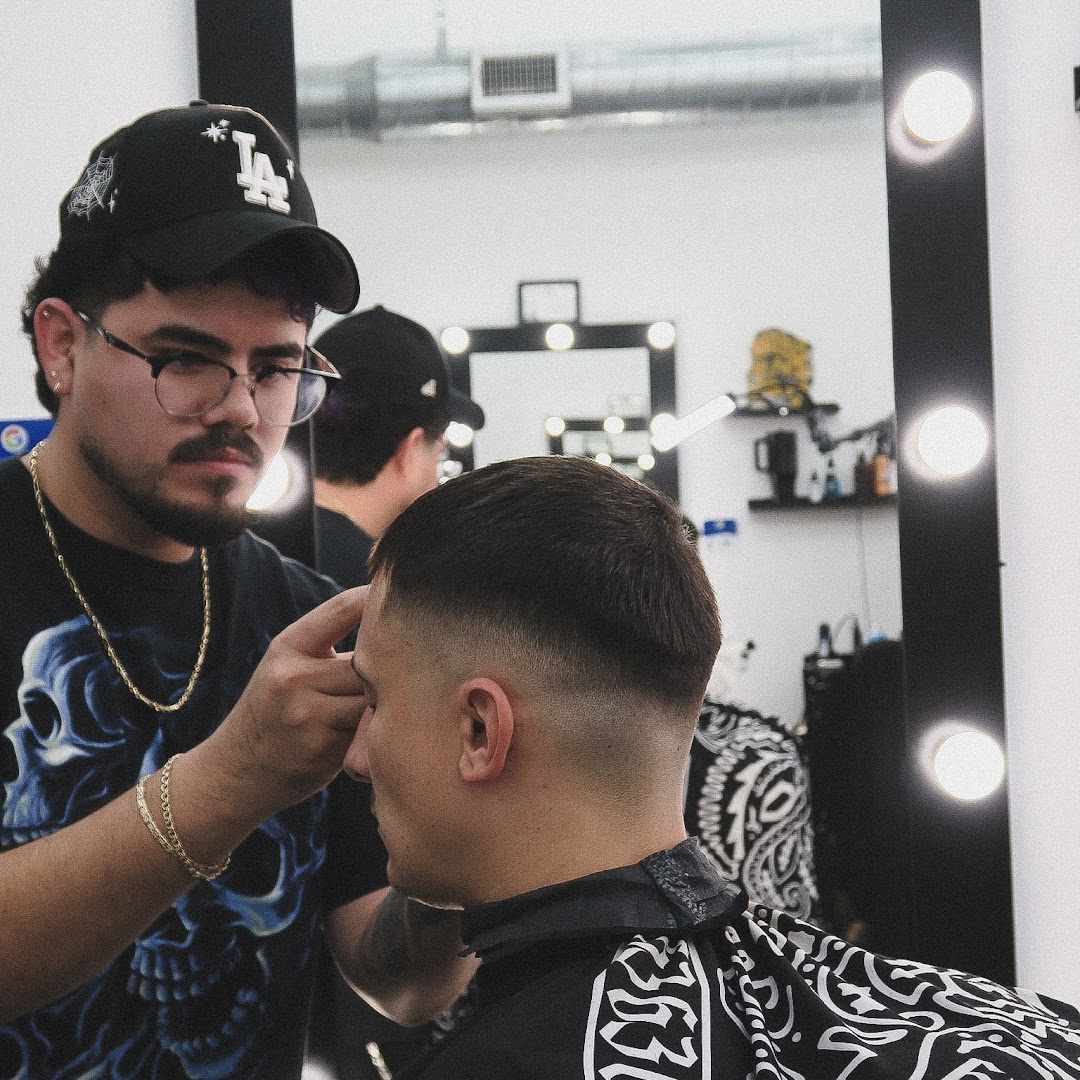 Javier at the chair, working on a client.
